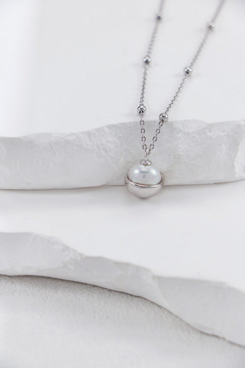 Silver & Pearl Flying Disc Necklace