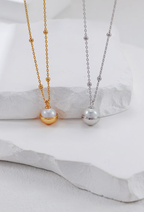 Gold Plated & Pearl Flying Disc Necklace